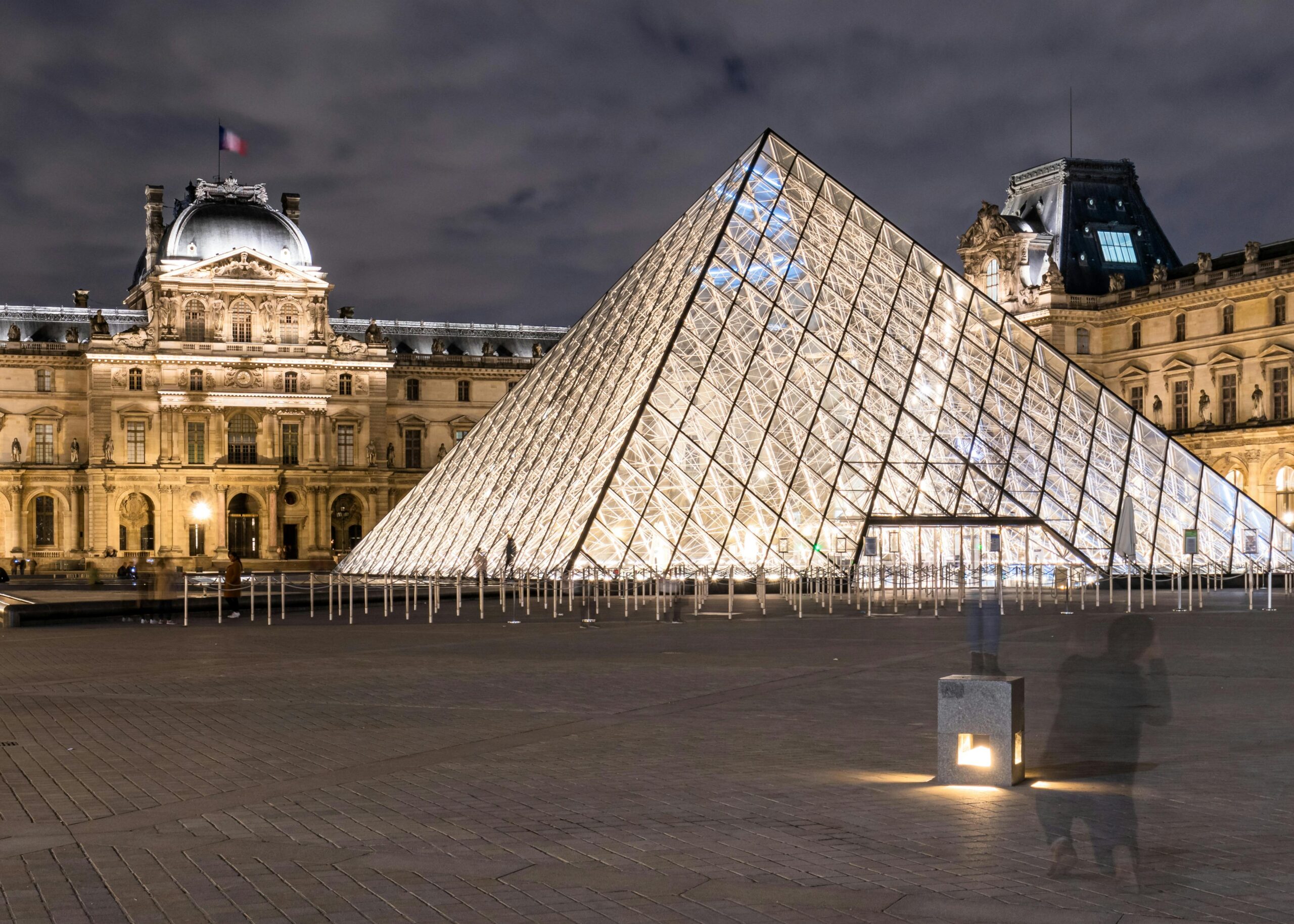 Why is the glass pyramid controversial Why is the glass pyramid controversial