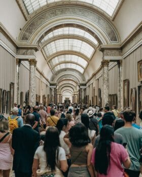 What is the best time to visit the Louvre to avoid crowds